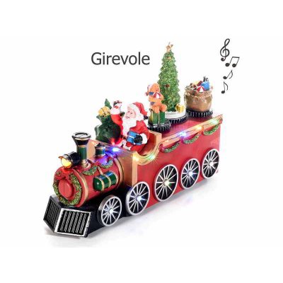 Weihnachtsmann im Zug mit bunten Lichtern und Musik - 